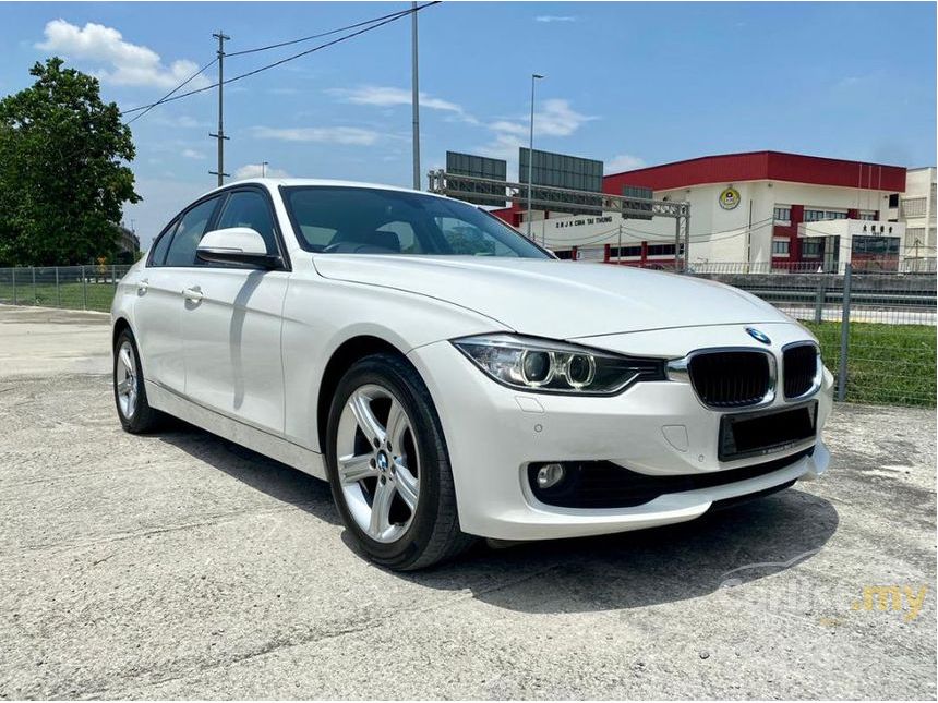 2014 bmw 316i 1.6 sedan 1 year warranty