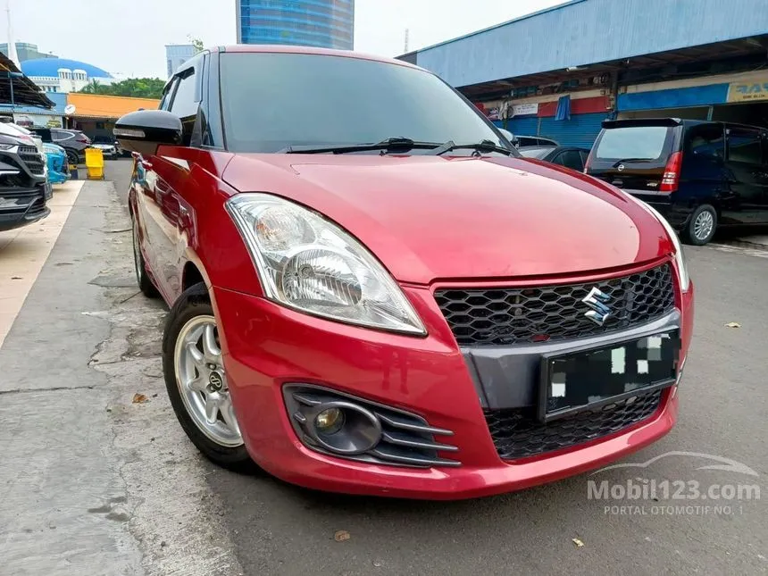 Jual Mobil Suzuki Swift 2014 GX 1.4 di DKI Jakarta Automatic Hatchback Merah Rp 107.000.000