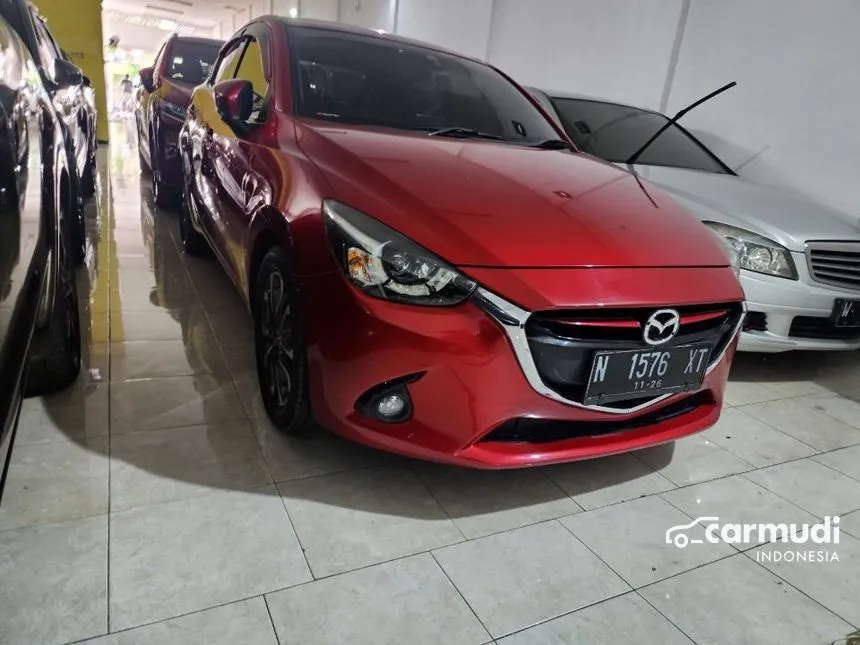 Jual Mobil Mazda 2 2015 GT 1.5 di Jawa Timur Automatic Hatchback Merah Rp 184.000.000