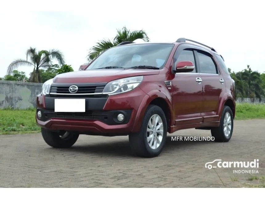 Jual Mobil Daihatsu Terios 2015 R 1.5 di Banten Manual SUV Merah Rp 135.000.000