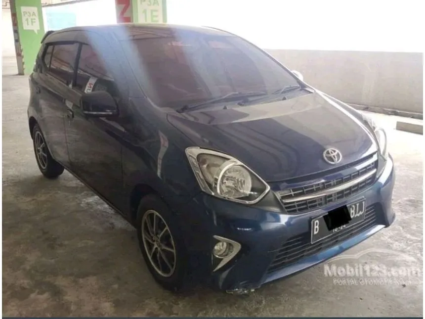 Jual Mobil Toyota Agya 2014 E 1.0 di DKI Jakarta Automatic Hatchback Biru Rp 70.000.000