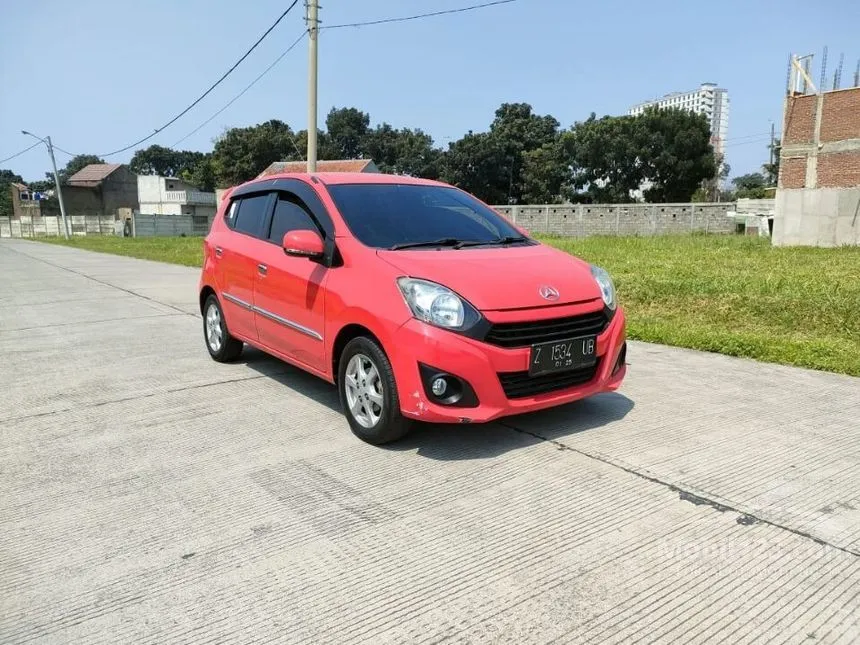 Jual Mobil Daihatsu Ayla 2015 X 1.0 di Jawa Barat Automatic Hatchback Merah Rp 79.000.000