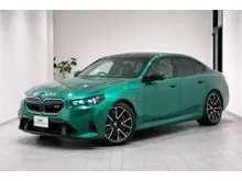2025 BMW M5 4.4 4WD, Mileage 1246km, Full-segment TV, Alcantara roof lining, Isle of Man Green Colour, INCOMING STOCK