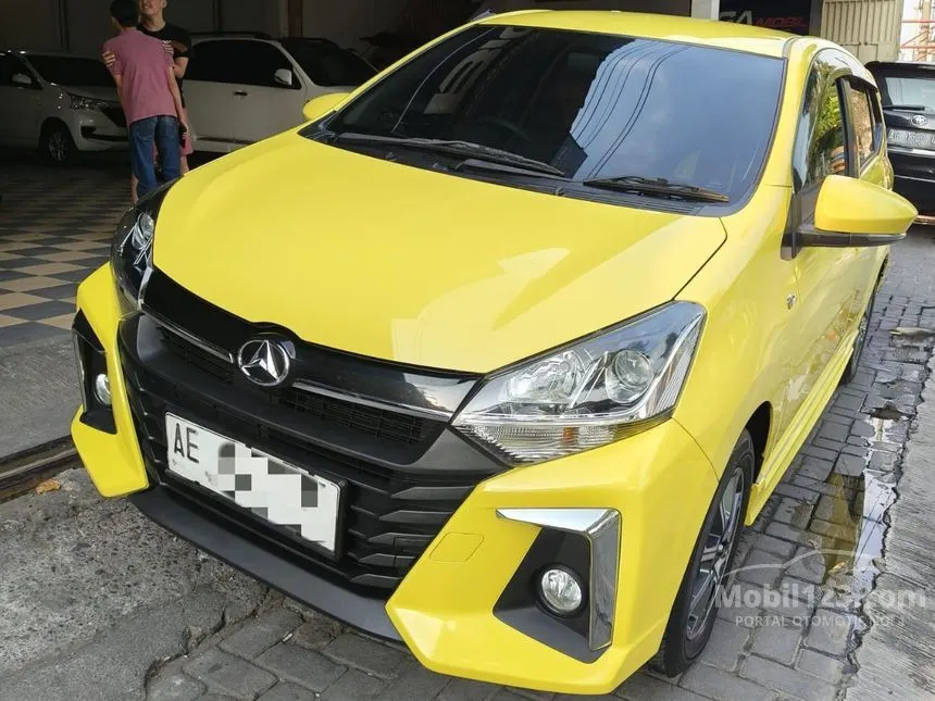 Jual Mobil Daihatsu Ayla 2022 R 1.2 di Jawa Timur Manual Hatchback Kuning Rp 142.000.000