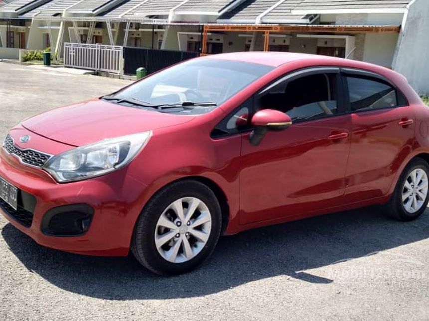 Jual Mobil KIA Rio 2012 UB 1.4 di Jawa Barat Automatic Hatchback Merah 