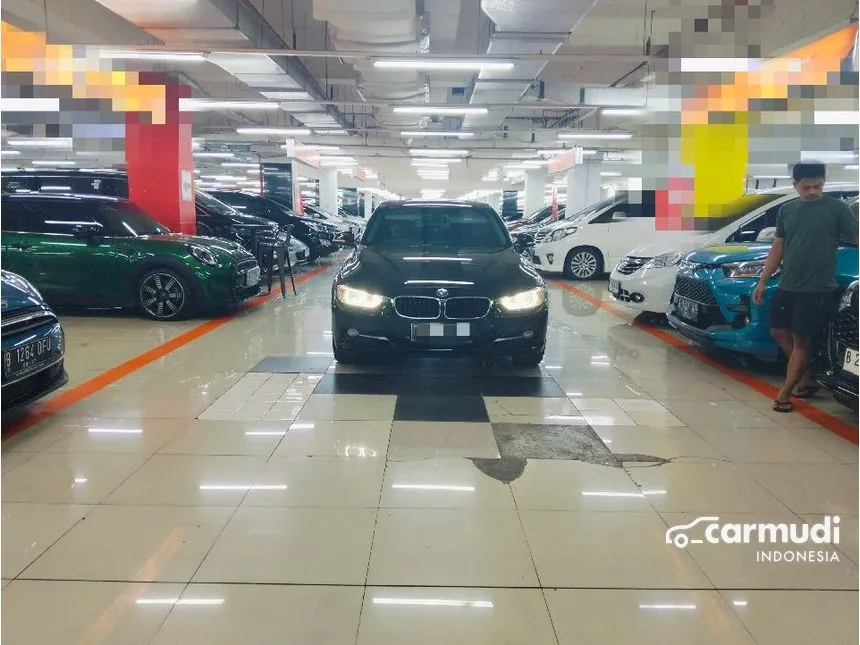 Jual Mobil BMW 320i 2014 Sport 2.0 di DKI Jakarta Automatic Sedan Hitam Rp 248.000.000