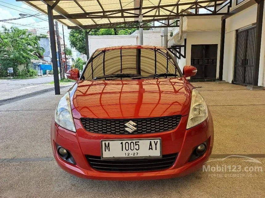 Jual Mobil Suzuki Swift 2012 GX 1.4 di Jawa Timur Manual Hatchback Merah Rp 120.000.000