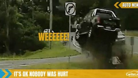 Toyota HiLux gets big air after skidding on greasy road