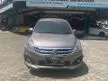 Jual Mobil Suzuki Ertiga 2017 GL 1.4 di Jawa Timur Manual MPV Abu