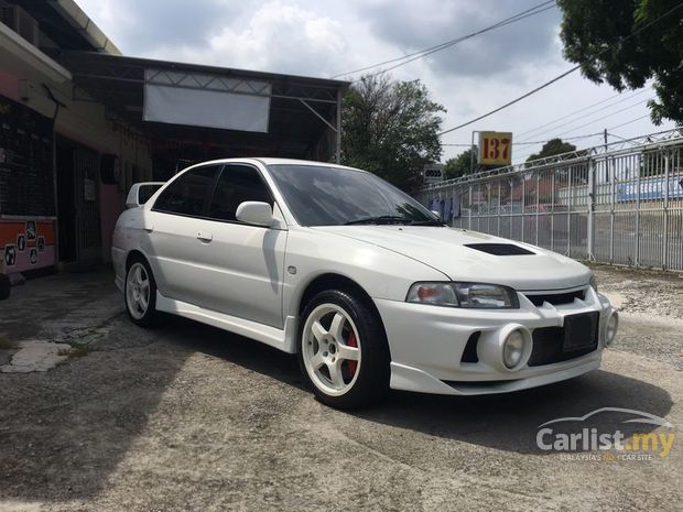  Harga  Mobil  Lancer  Evo  4  Tahun 1997 Tentang Tahun