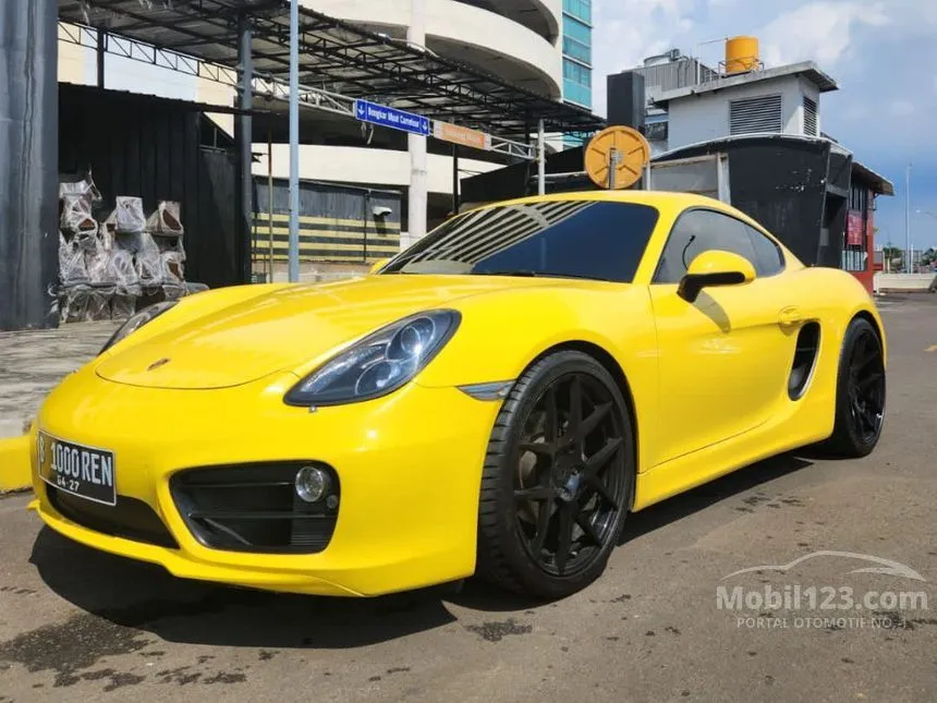 Jual Mobil Porsche Cayman 2014 2.7 di DKI Jakarta Automatic Coupe Kuning Rp 1.599.000.000