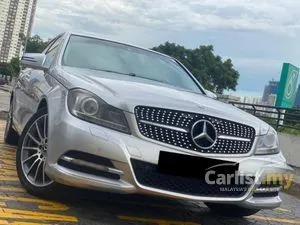 YEAR MADE 2011 MERCEDES-BENZ C200 1.8 ELEGANCE CGI SEDAN ONE OWNER LOW MILEAGE MULTIFUNCTION STEERING REVERSE CAMERA PROMOTION OFFER PRICE