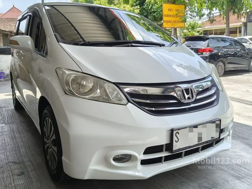 Jual Mobil Honda Freed 2013 E 1.5 di Jawa Timur Automatic MPV Putih Rp 149.000.000