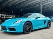 Recon 2019 Porsche 718 2.0 Cayman Coupe Miami blue, Bose, GT Sport Steering Wheel, PCM Porsche Crests On Headrests