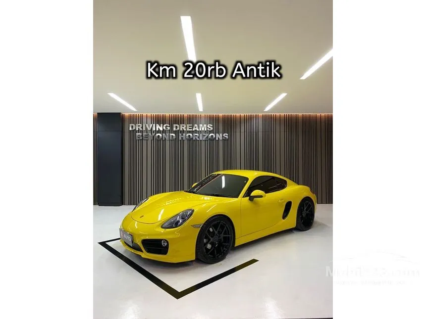 Jual Mobil Porsche Cayman 2014 2.7 di DKI Jakarta Automatic Coupe Kuning Rp 1.395.000.000
