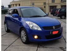 2013 Suzuki Swift 1.4 GX Hatchback matic biru dp 19jtan