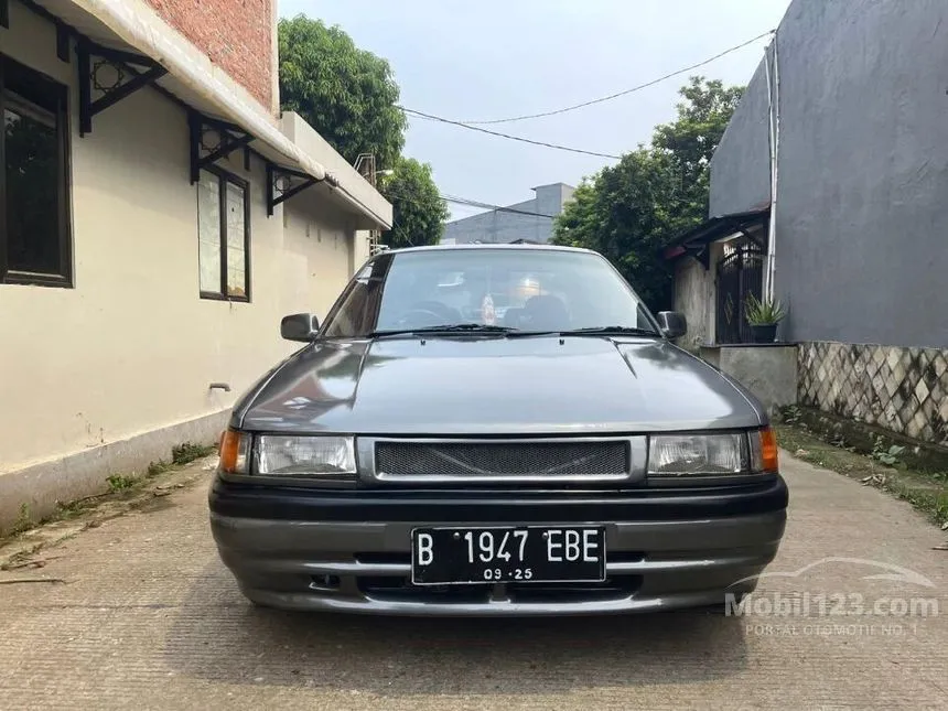 Jual Mobil Mazda 323 1991 1.6 di Banten Manual Sedan Abu