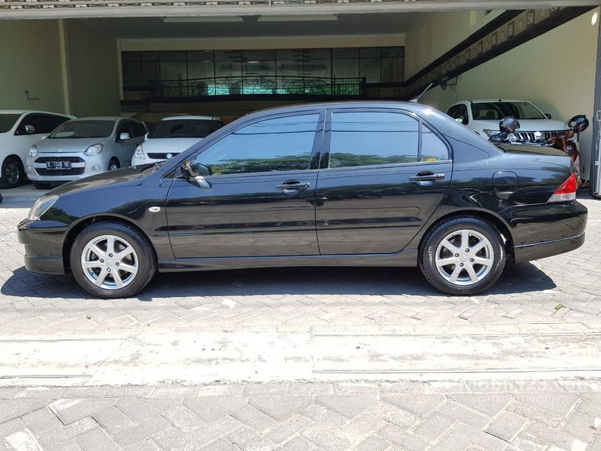 Jual Mobil Mitsubishi Lancer 2012 1.8 SEi 1.8 di Jawa Timur Automatic