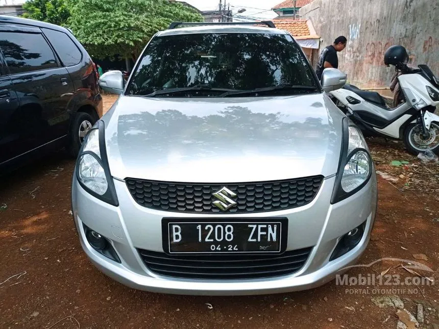 Jual Mobil Suzuki Swift 2014 GX 1.4 di Jawa Barat Automatic Hatchback Silver Rp 129.000.000