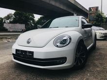 VOLKSAWAGEN BEETLE 1.2(A) 1 YEAR WARRANTY 2014,CRYSTAL WHITE IN COLOUR,FULL LEATHER SEATS,SMOOTH ENGINE GEAR BOX,4 MICHILIN TYRES,ONE DATIN OWNER