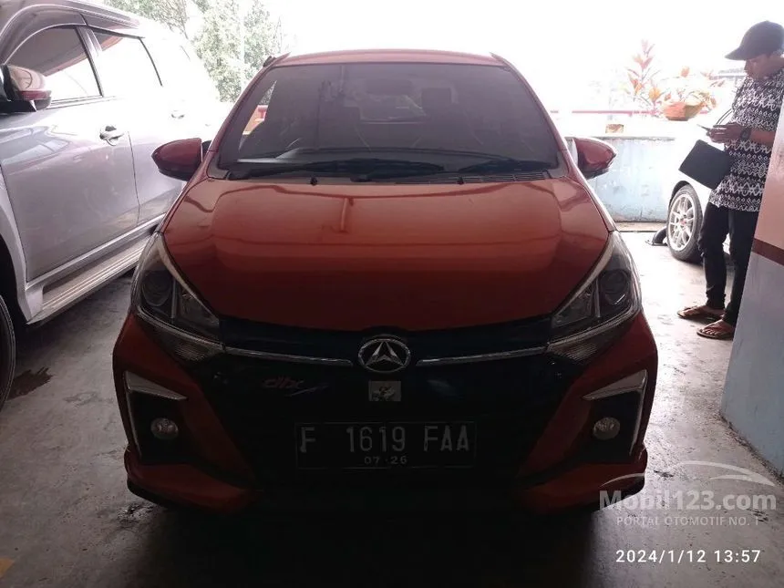 Jual Mobil Daihatsu Ayla 2021 R Deluxe 1.2 di Jawa Barat Automatic Hatchback Orange Rp 131.000.000